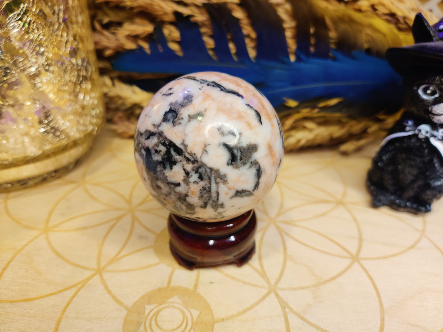 rhodochrosite crystal sphere carving gemstone